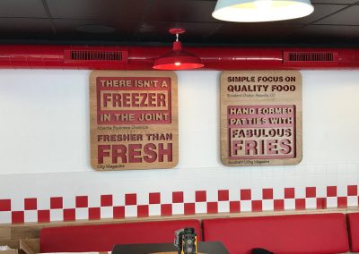 Five Guys Internal Timber Signs