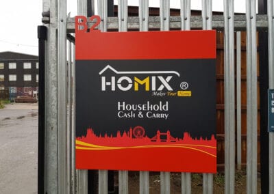 Industrial park sign made from aluminium with printed vinyl graphic fixed to gate