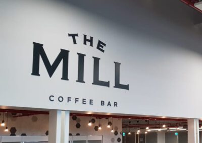 black acrylic letters on wall coffee bar sign