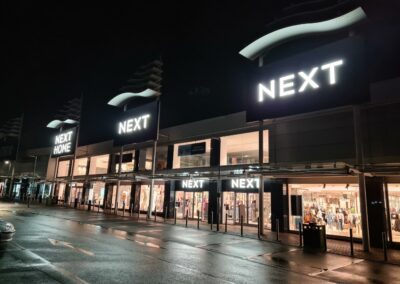 Next store front flex box signs with illuminated letters