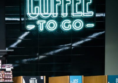 faux neon M&S coffee to go sign