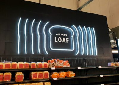 use your loaf faux neon M&S bakery sign